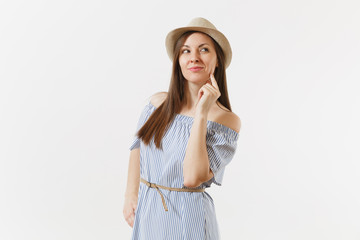 Young pensive dreamful tender elegant charming woman dressed blue dress, cute hat posing isolated on white background. People, sincere emotions, lifestyle concept. Advertising area. Copy space.