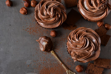 Chocolate cupcakes with peanut paste the old grunge background