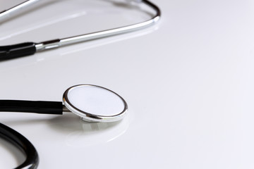 Stethoscope isolated on white table background.