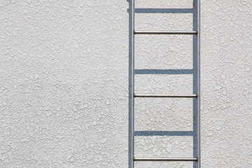 Fire escape on concrete wall