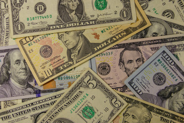Background of different dollar banknotes
