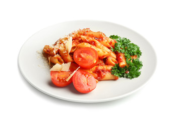 Plate with delicious penne pasta and garnish on white background