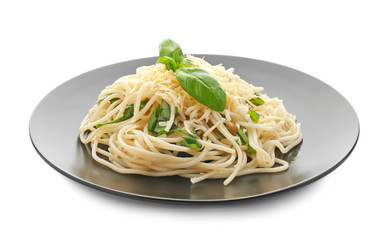 Plate of delicious pasta with cheese and basil on white background