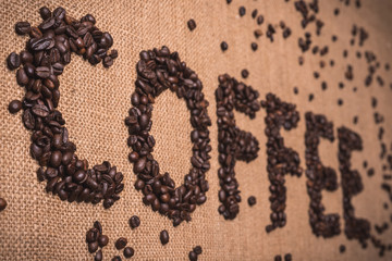 coffee word with coffee beans