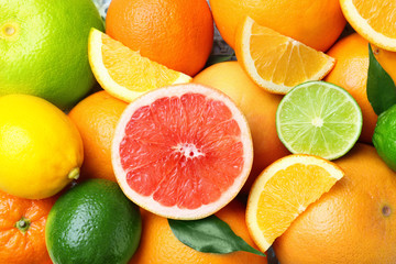 Ripe citrus fruits as background