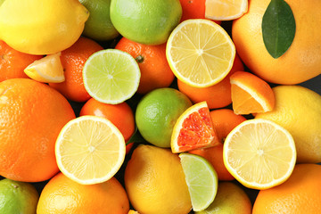Fototapeta na wymiar Ripe citrus fruits as background