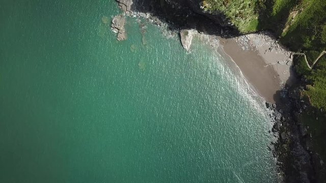 Aerial of The Valley of Rocks in north Devon, England west of the village Lynton, top down birds eye view of the bay