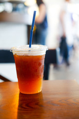 Orange and coffee cocktail on the wooden table