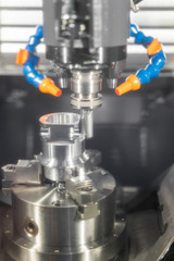 High precision CNC machining center working, operator machining automotive sample part process