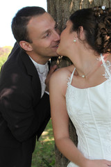 wedding couple kiss in love in marriage day outdoors