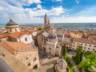 Aerial view of the Basilica of Santa Maria Maggiore and Cappella Colleoni in Citta Alta of Bergamo,...