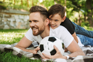 Happy young father with his little son with football © Drobot Dean