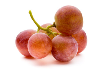Ripe red grape isolated on white.
