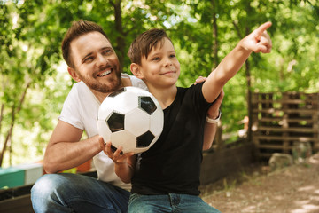 Happy young father have fun with his little son