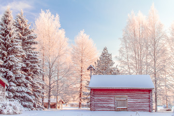 Old finnish building in winter scene. Kuhmo, Finland.