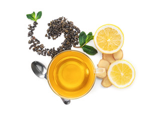 Flat lay composition with delicious tea, mint, lemon and ginger on white background