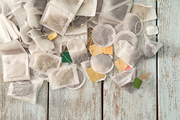 Tea bags on wooden table