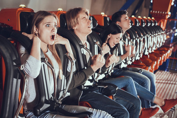 Close up portrait of four shocked guys