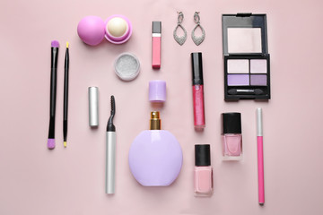 Set of decorative cosmetics on color background