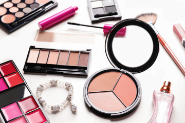 Set of decorative cosmetics on white background