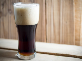 glass of dark beer with copyspace