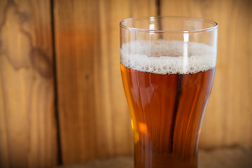glass of cold beer close - up with copyspace