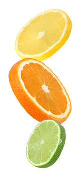 orange, lemon and lime fruits hanging, falling and flying piece isolated on white background with clipping path