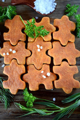 Puzzle shaped salty cookies with tomato paste and paprika