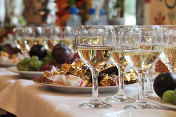 glasses with wine on a table in a restaurant