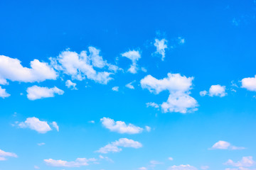 Blue sky with white light clouds