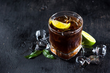alcohol drik whiskey in glass in black background