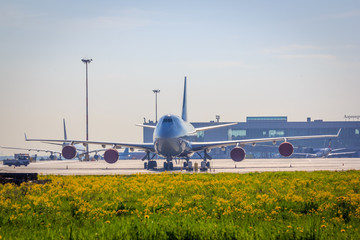 Fototapeta premium The plane is in the parking lot