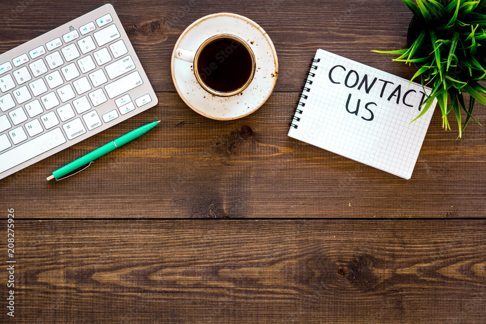 Poster template for contacts, background for contact information. lettering contact us in notebook on offic
