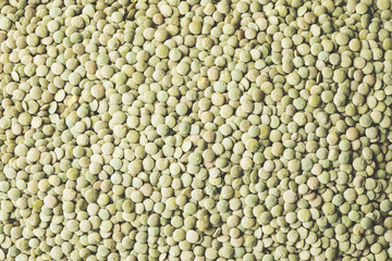 Heap of green lentils texture