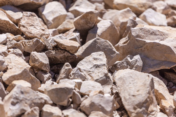 Rocks, small rocks or gravel Used for construction of buildings, roads and for landscaping