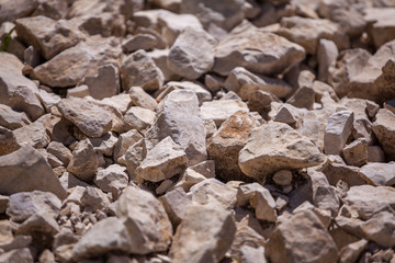 Rocks, small rocks or gravel Used for construction of buildings, roads and for landscaping