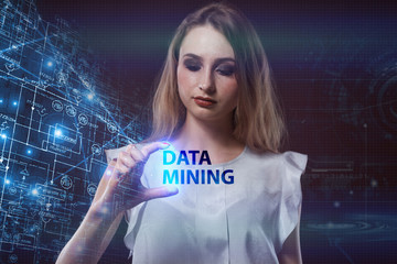 The concept of business, technology, the Internet and the network. A young entrepreneur working on a virtual screen of the future and sees the inscription: Data mining