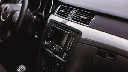 Fototapeta na wymiar modern car interior. air condition in auto. car multimedia and navigation
