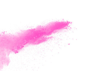 abstract pink powder explosion on white background. Freeze motion of pink dust splattered.