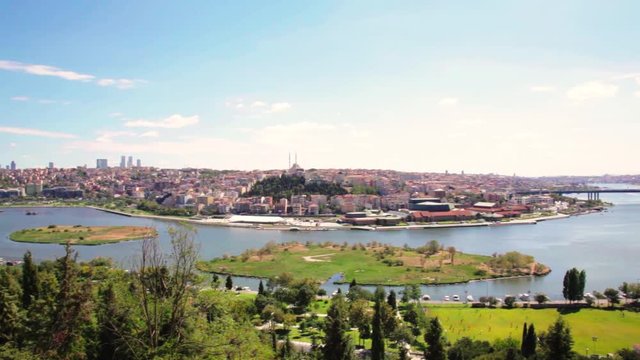 Cemetery Sultan Eyup, The Halich Bridge and panoramic view of the Golden Horn Bay in Istanbul, Turkey.