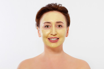 Middle age macro woman face. Summer anti aging collagen mask on woman wrinkle face isolated on white background. Spa and menopause concept. Copy space