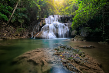 Fototapeta na wymiar The most beautiful waterfall is called Huai Mae Khamin Waterfall in Kanchanaburi, Thailand and tourists prefer this waterfall because the water is clean and clear.