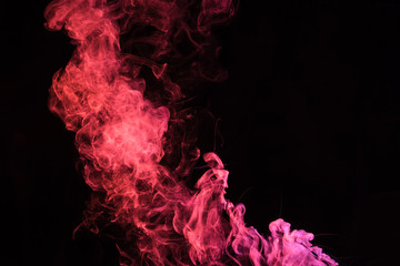 pink spiritual smoky swirl on black background with copy space