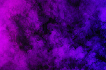 Fototapeta na wymiar purple smoke on abstract black background