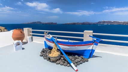 Fototapeta na wymiar Picturesque balcony on Santorini island