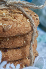 Cookies with sesame and sunflower seeds on plaid. Healthy eating