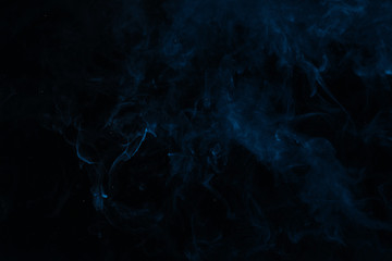 abstract dark smoky texture with blue swirl
