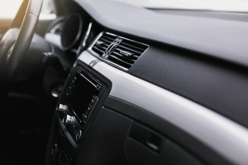Fototapeta na wymiar Car air conditioning. The air flow inside the car. Detail interior of car