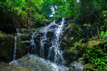 Fototapeta premium Ton Sai Waterfall in the forest Phuket Thailand. Tropical zone,Top Tourist Destinations.