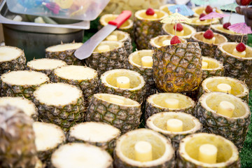 Fresh Tropical Pina Colada cocktail served in a pineapple